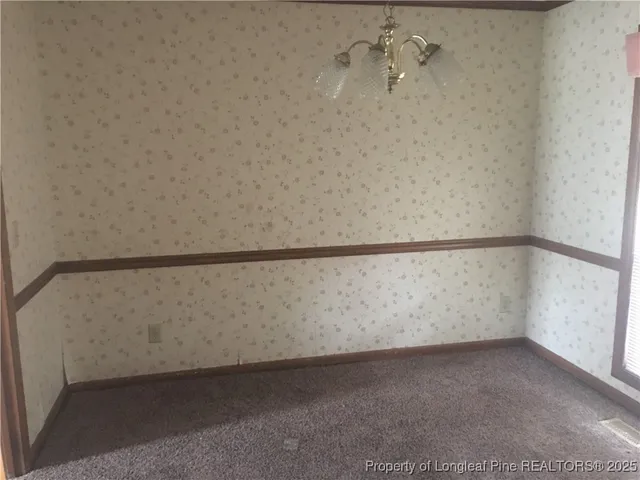 a utility room with a bathtub