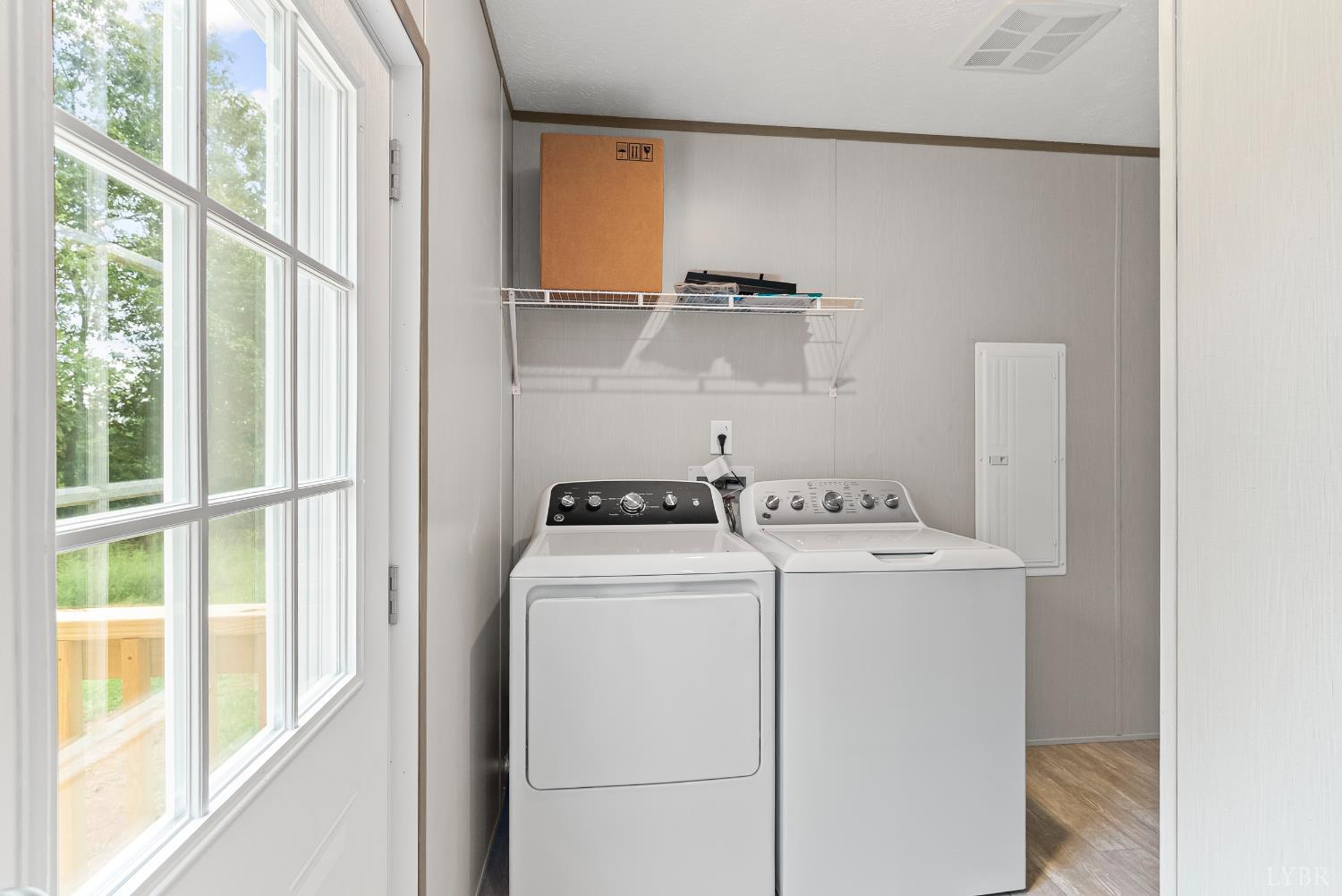 4526 Pigeon Run Road Gladys, VA 24554 - Photo 12 of 54 a view of storage and utility room with washer and dryer