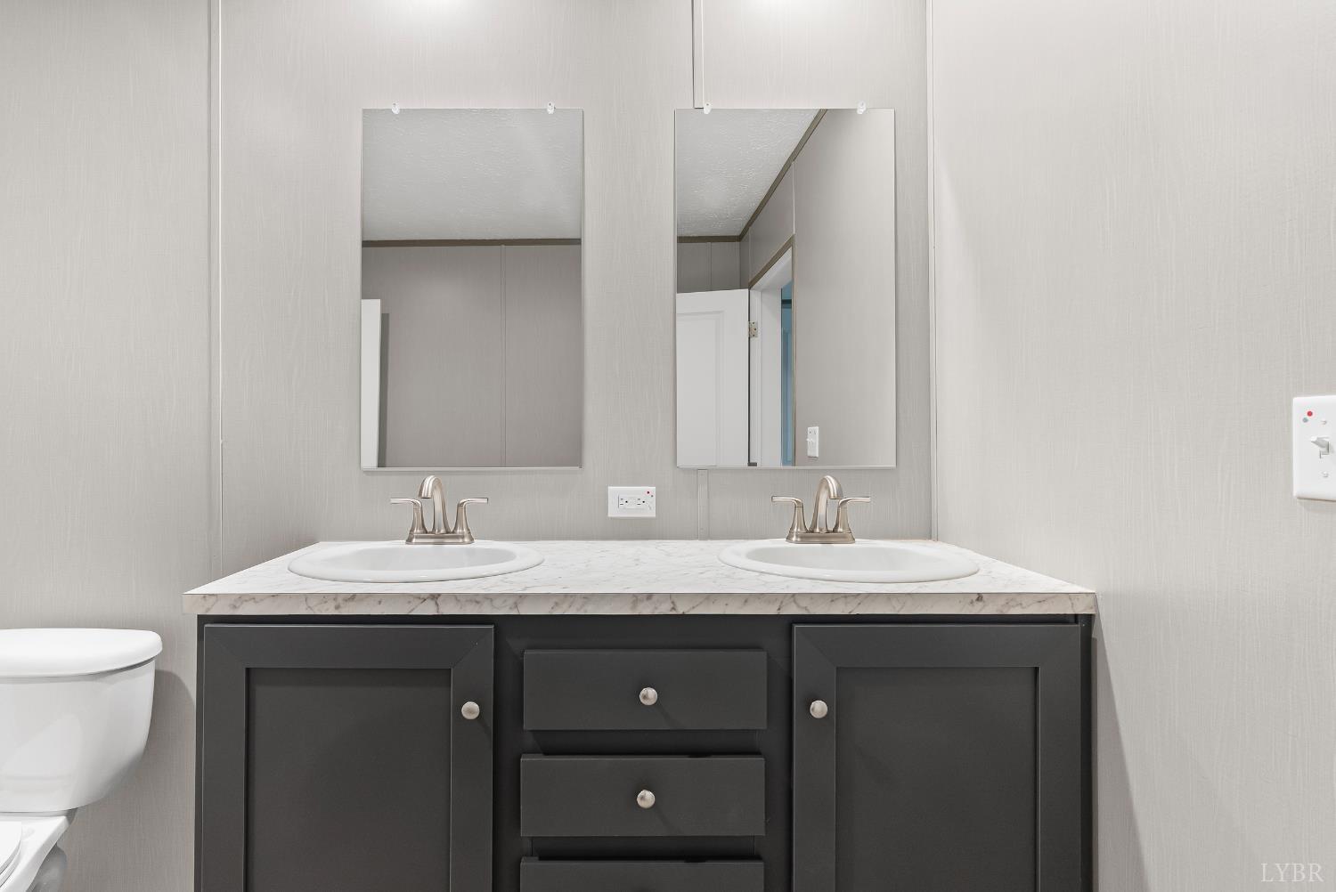 4526 Pigeon Run Road Gladys, VA 24554 - Photo 18 of 54 a bathroom with a sink and a toilet