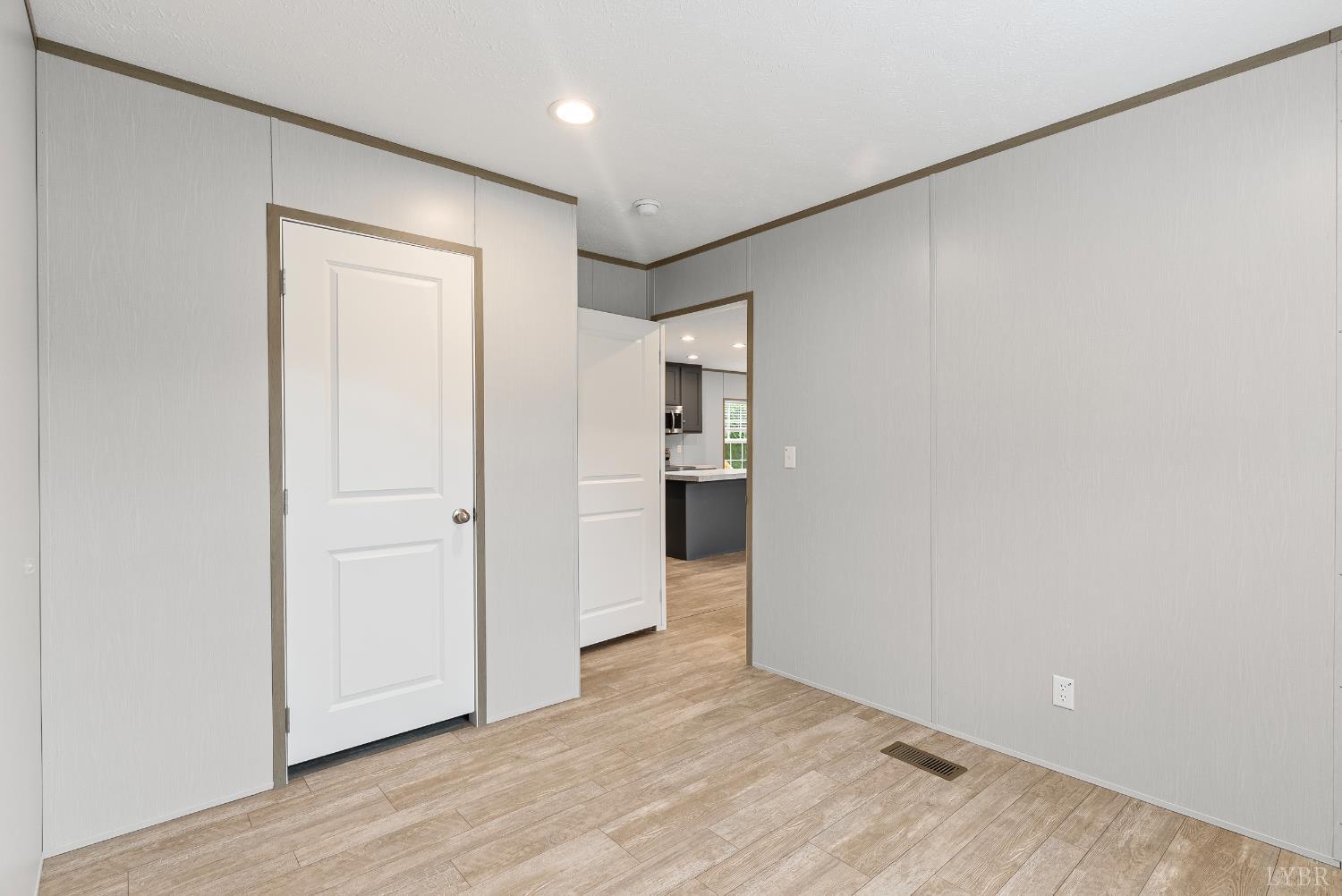 4526 Pigeon Run Road Gladys, VA 24554 - Photo 20 of 54 a view of empty room with wooden floor