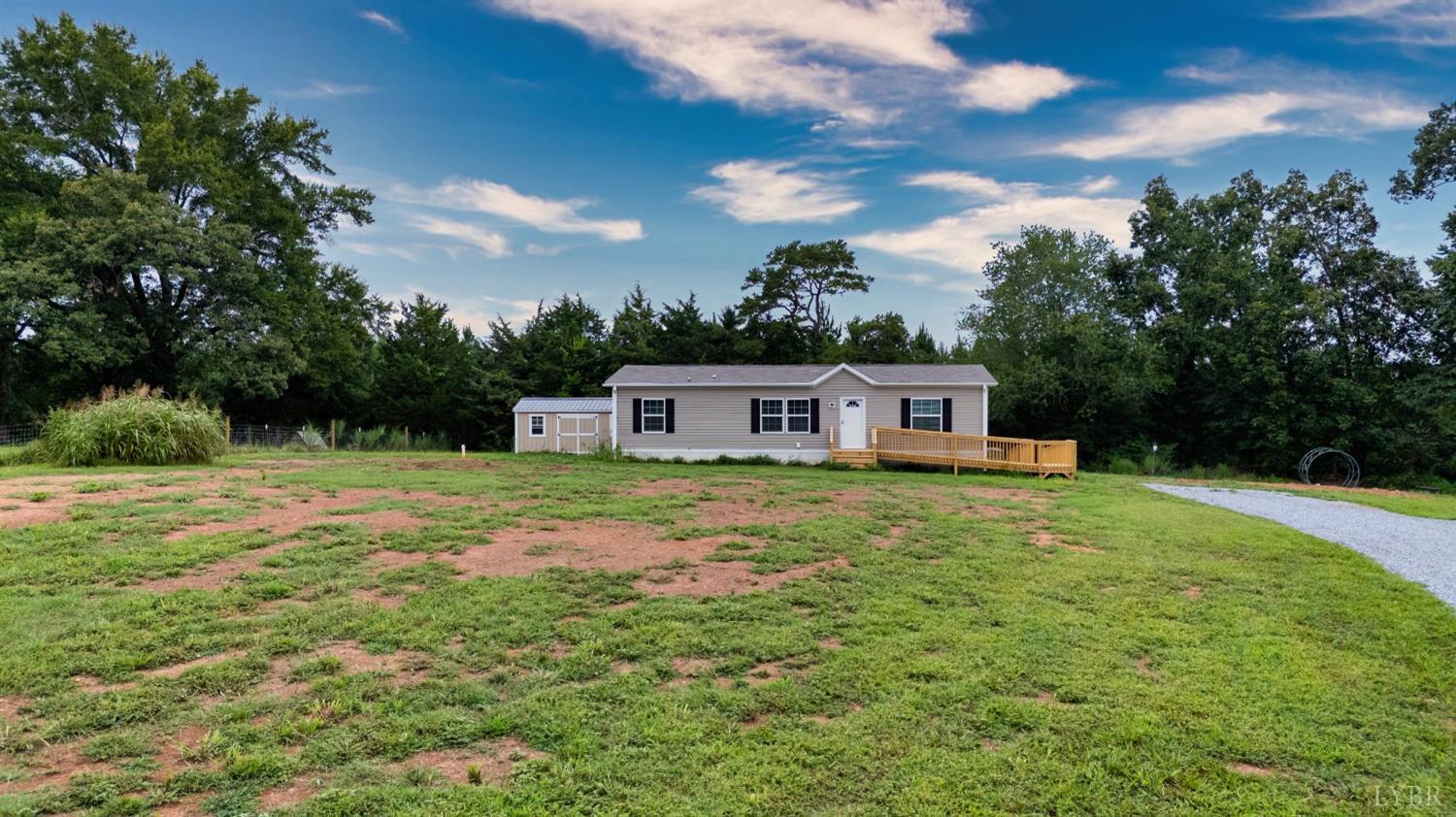 4526 Pigeon Run Road Gladys, VA 24554 - Photo 28 of 54 a front view of a house with a garden