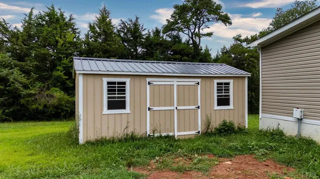a view of outdoor space with furniture and garden
