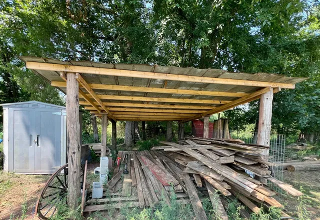 a view of a green field with clear sky