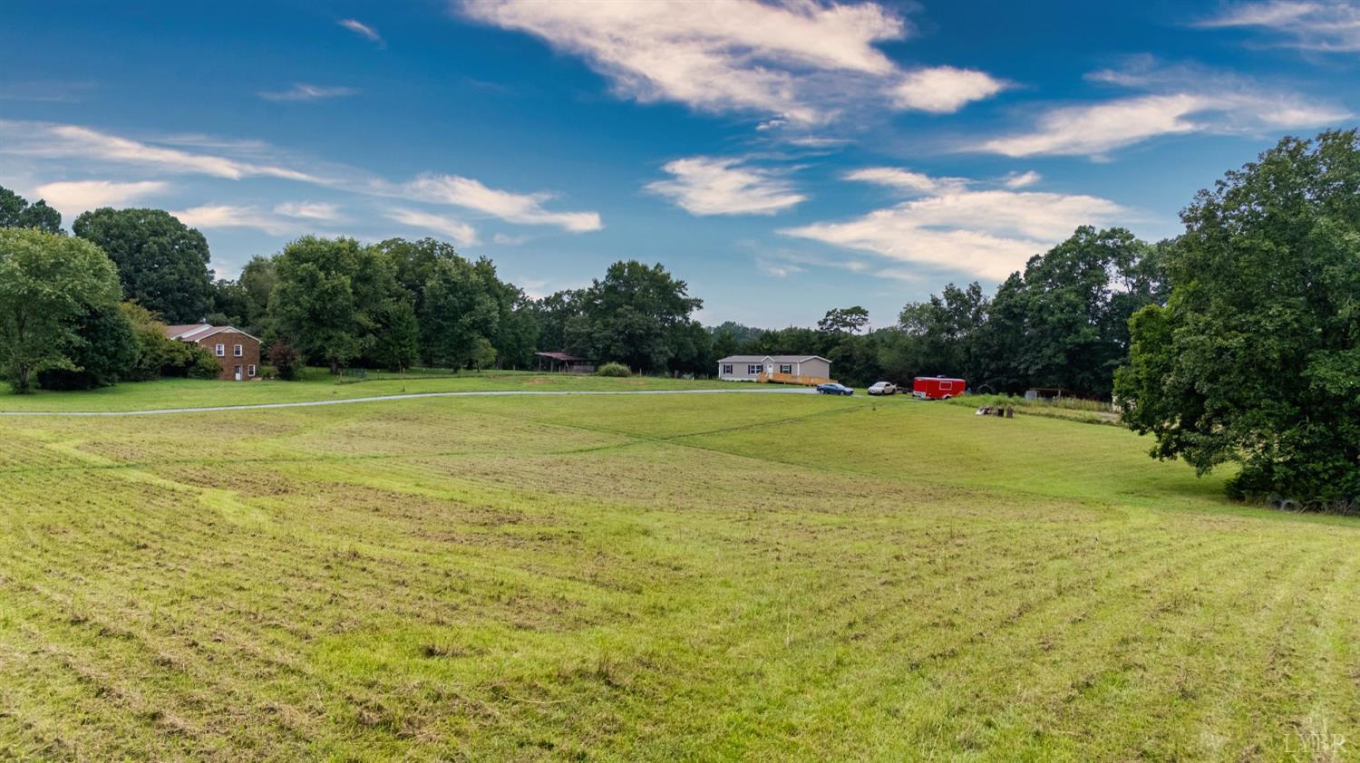 4526 Pigeon Run Road Gladys, VA 24554 - Photo 46 of 54 a view of a green field with clear sky