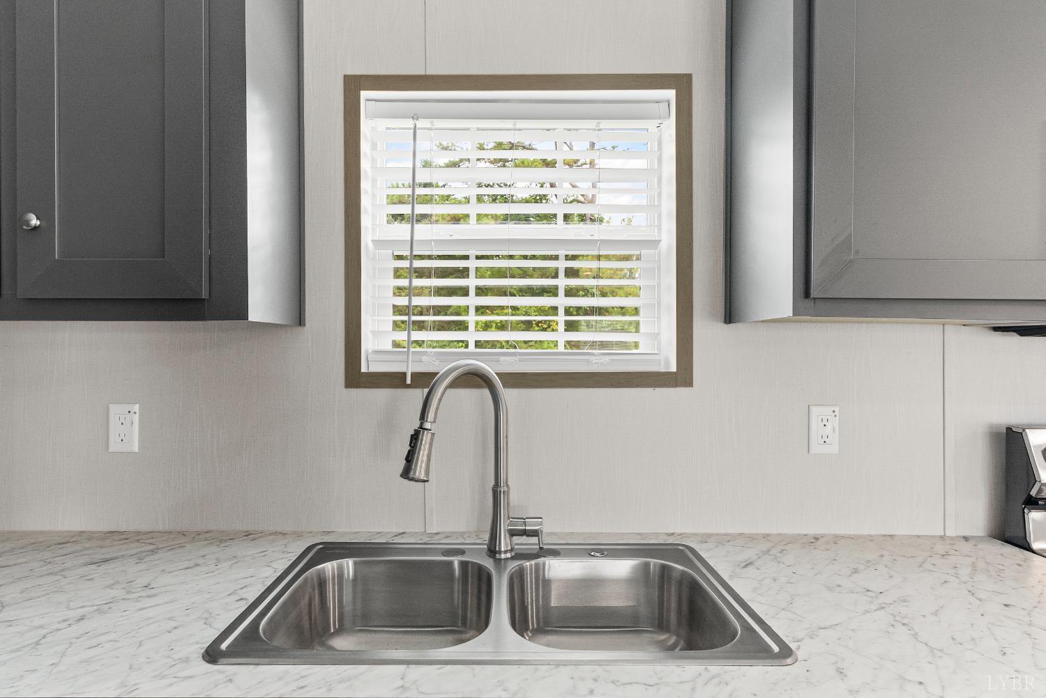 4526 Pigeon Run Road Gladys, VA 24554 - Photo 9 of 54 a kitchen with a sink and a window