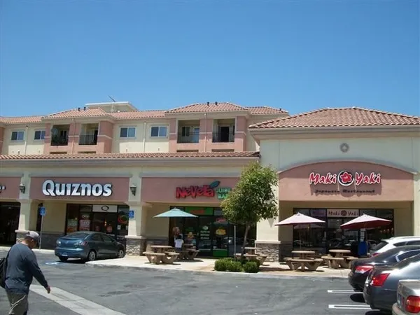 a store with outdoor seating area