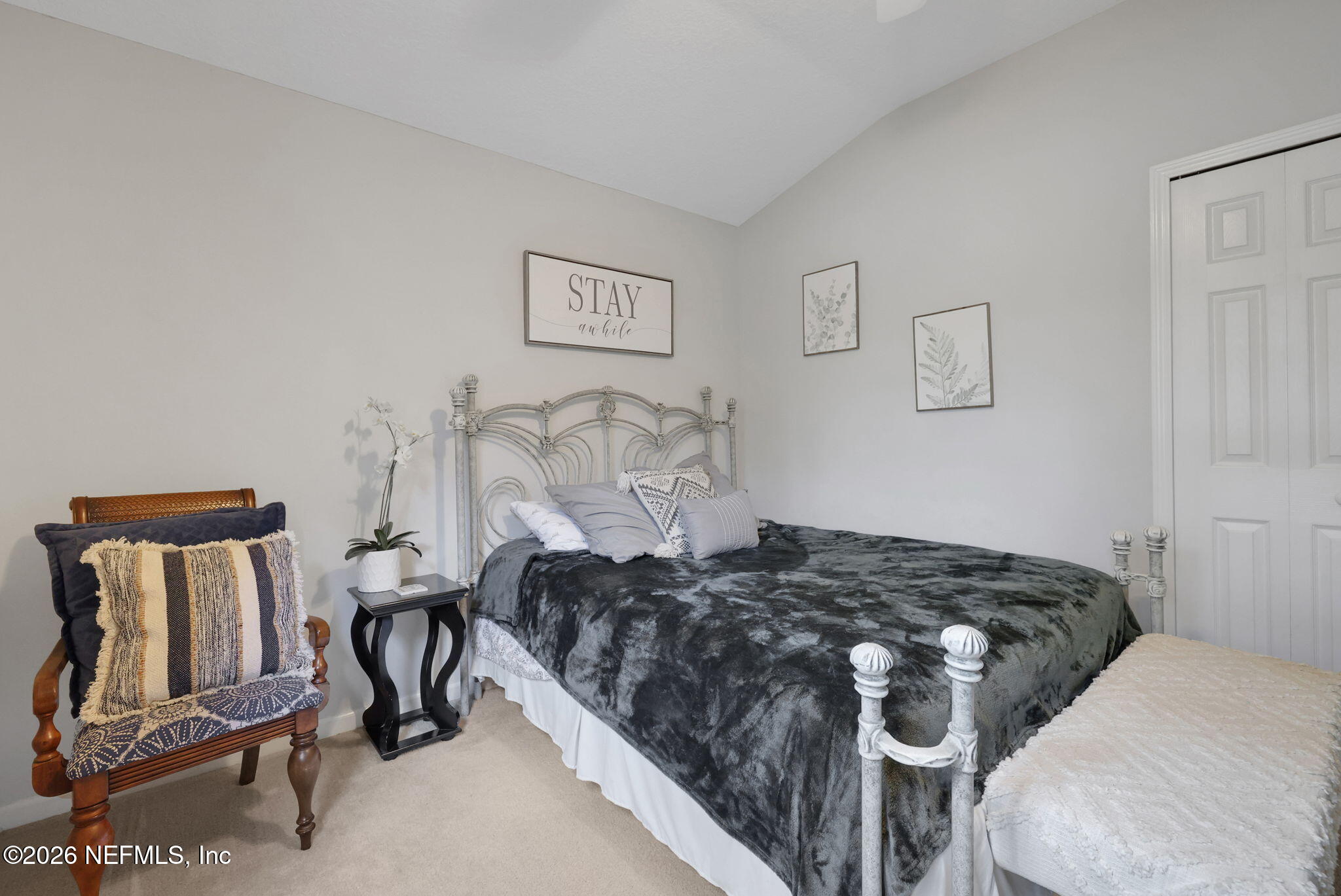 4320 Rye Court St. Johns, FL 32259 - Photo 43 of 60 a bedroom with a bed and chair