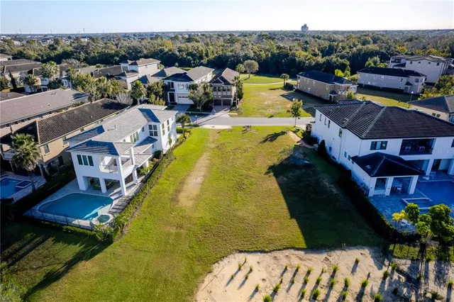 a view of a swimming pool with a table and chairs