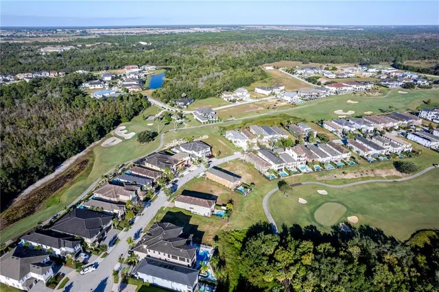 aerial view of a house with a garden