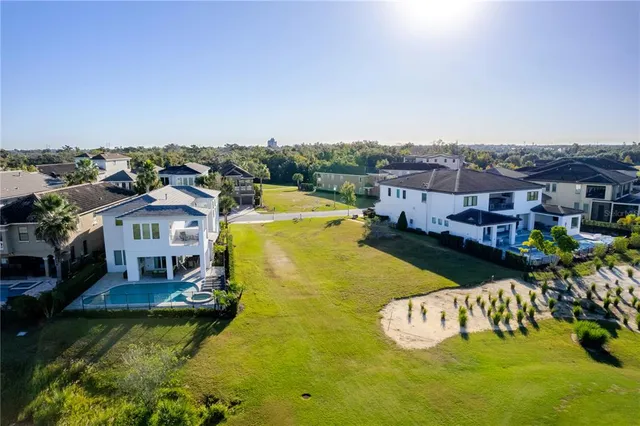 a view of a city with lawn chairs