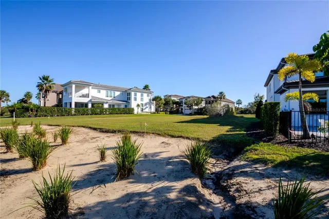 a view of a lake with a building in the background
