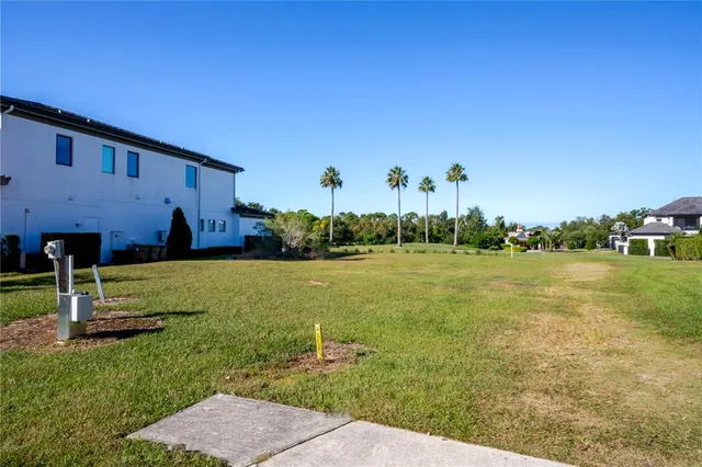 a view of a garden with houses