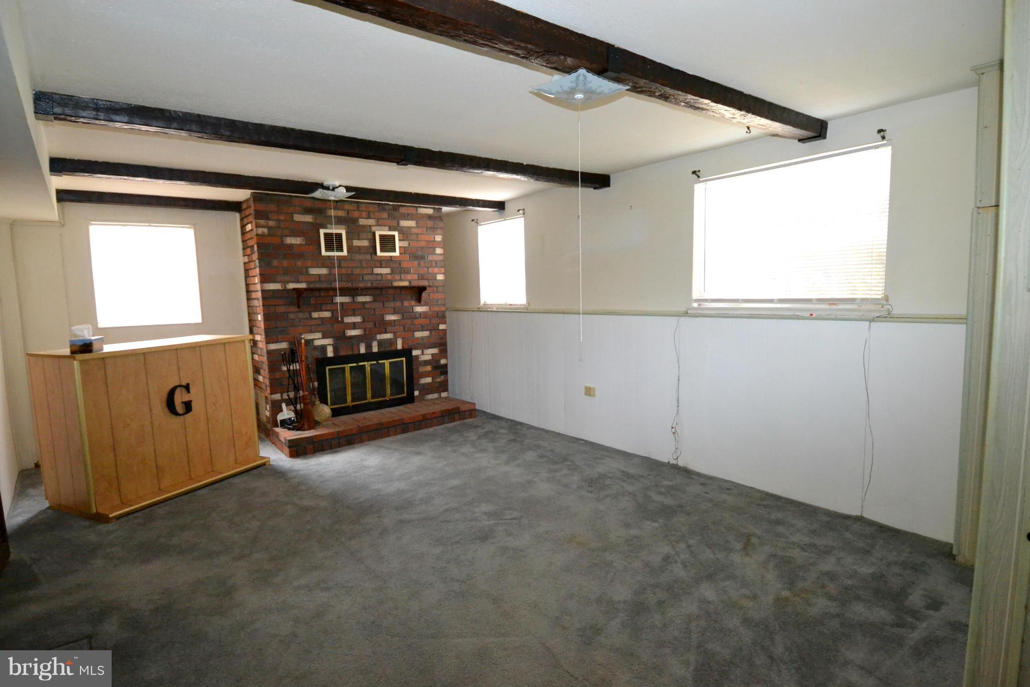 515 Crosby Road Catonsville, MD 21228 - Photo 11 of 19 Recreation Room w/Wood Burning Fireplace