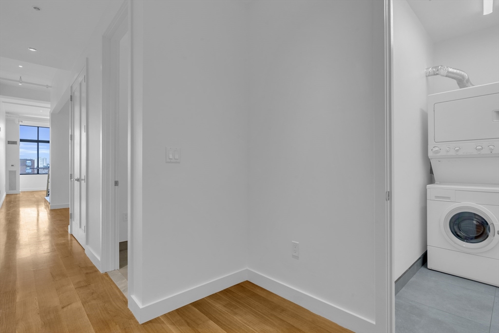 70-72 Northampton Street, Unit 502 Boston, MA 02118 - Photo 17 of 19 a view of a storage & utility room with a washer dryer
