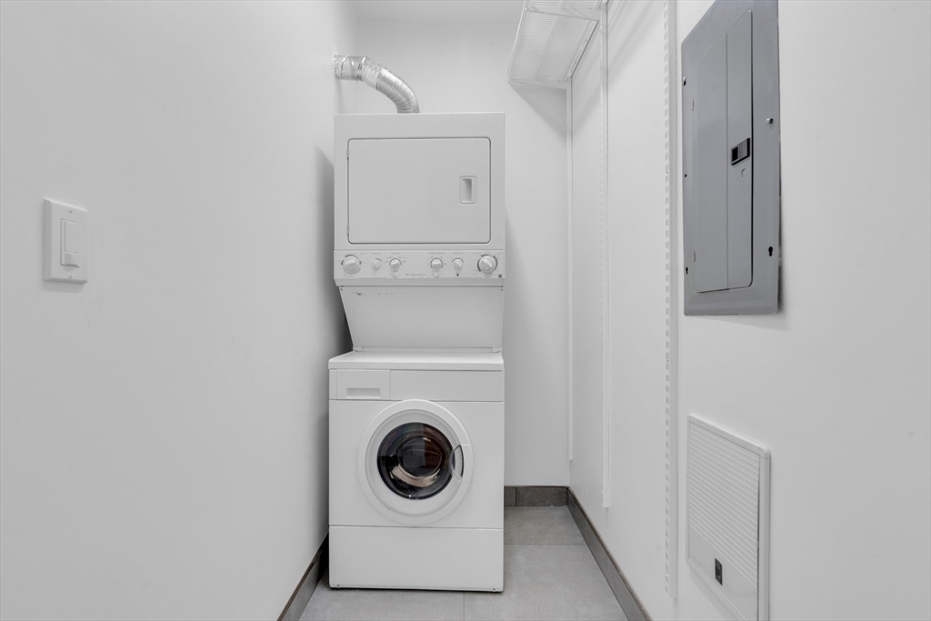 70-72 Northampton Street, Unit 502 Boston, MA 02118 - Photo 18 of 19 a utility room with dryer and washer