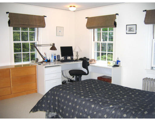 65 Wauwinet Road Newton, MA 02465 - Photo 10 of 12 a bedroom with a bed and a large window