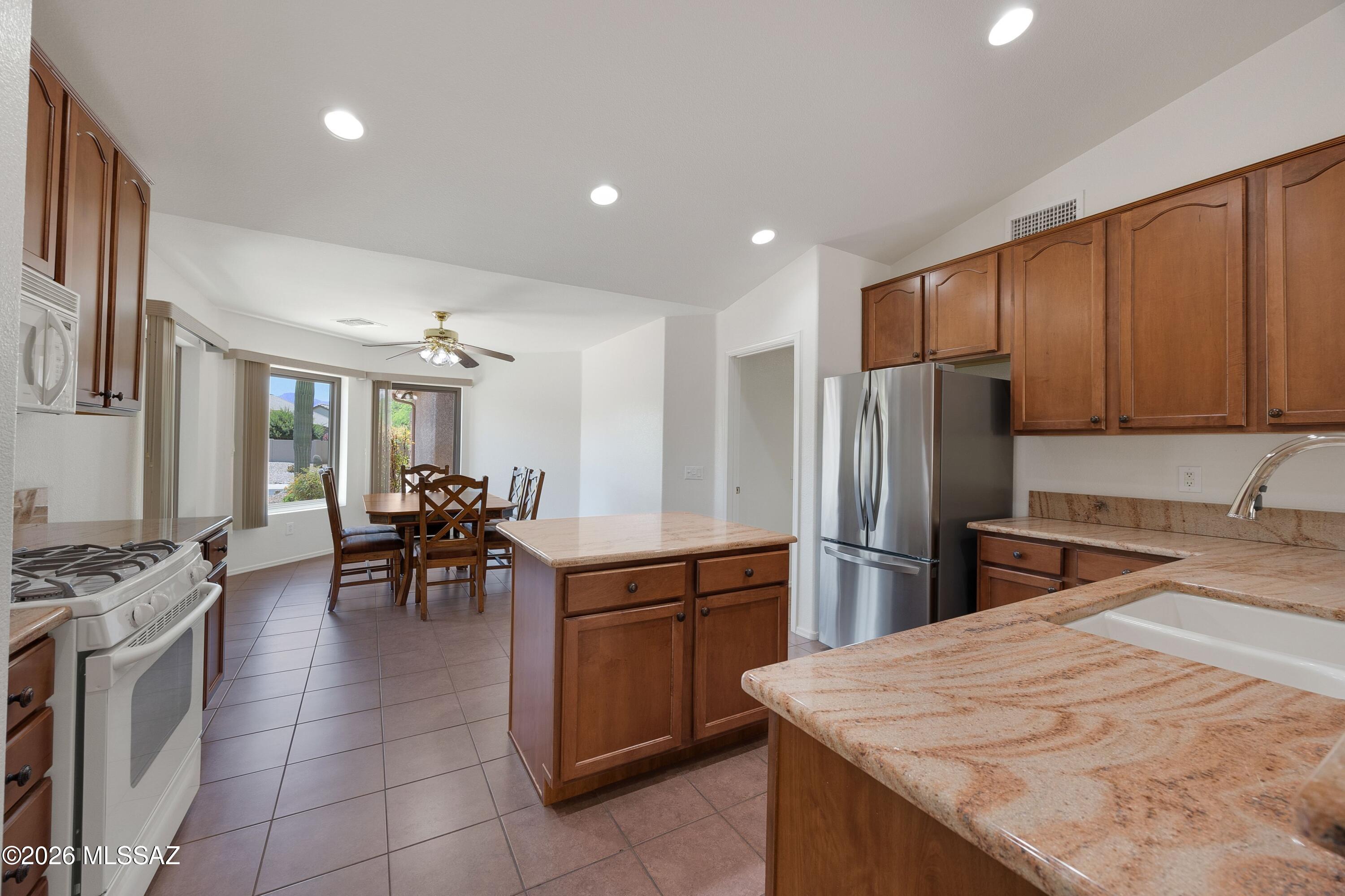 62574 East Northwood Road Tucson, AZ 85739 - Photo 10 of 50 Kitchen has lovely granite counters