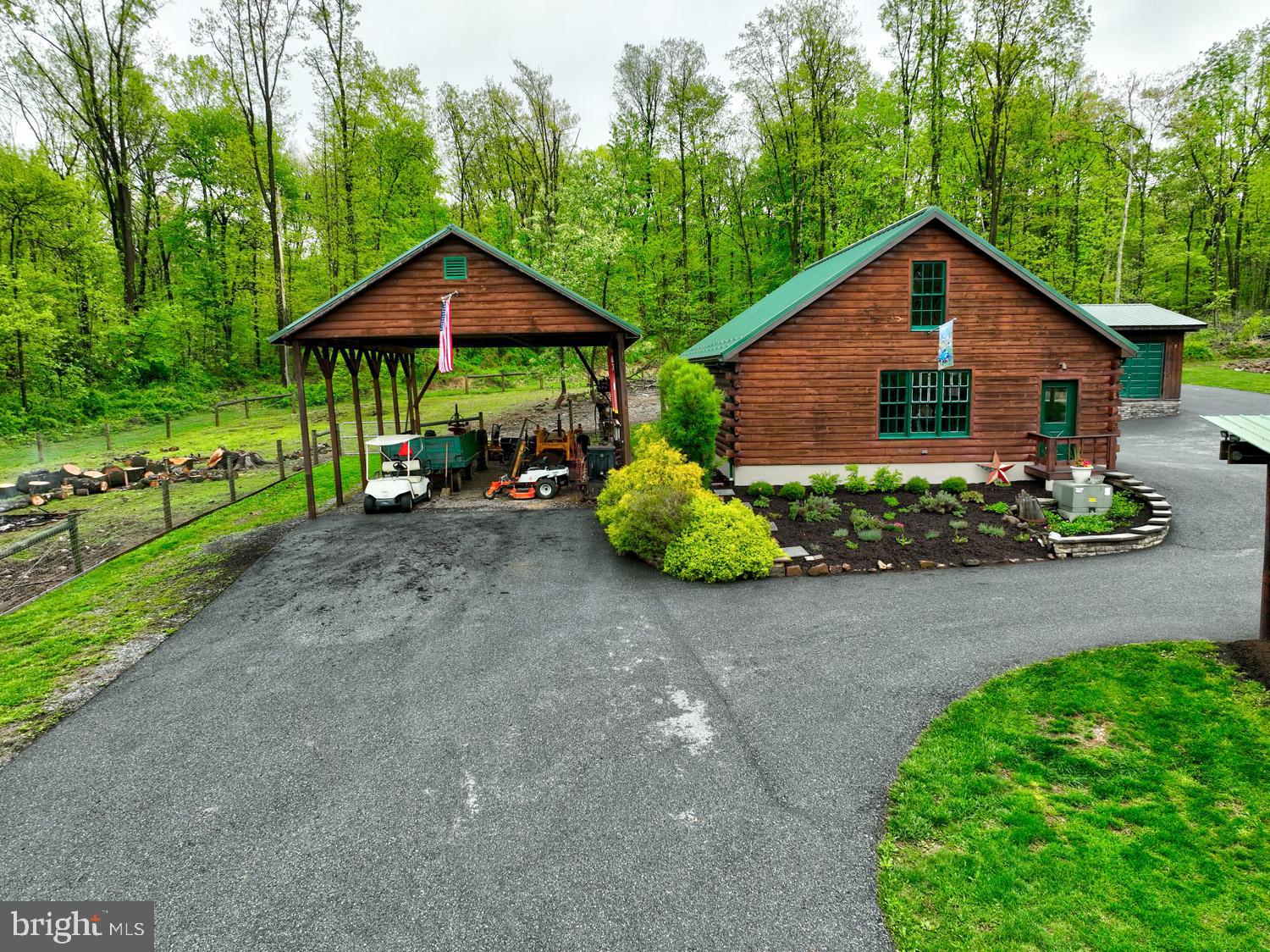 491 Sheep Hill Road Newmanstown, PA 17073 - Photo 25 of 30 a view of a house with a yard and potted plants