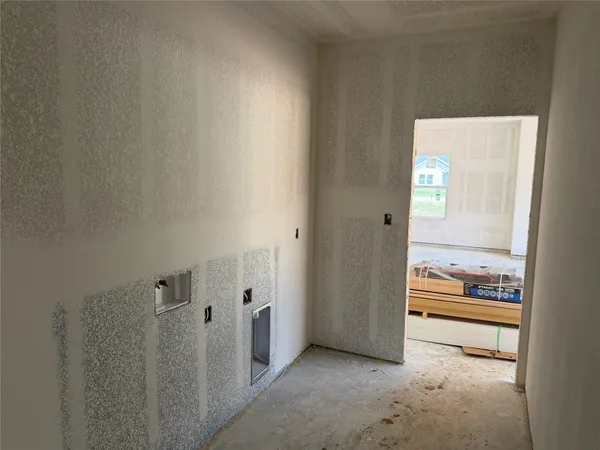 a view of a livingroom with wooden floor