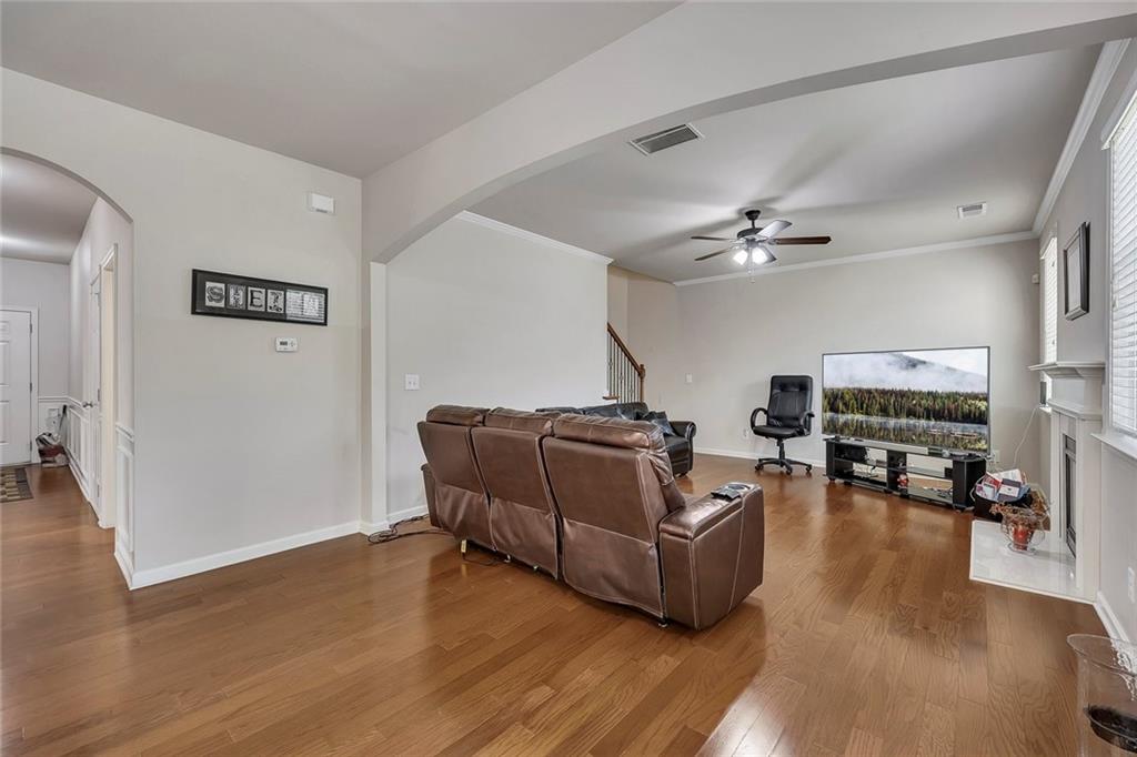 6204 Oakdale Ridge Court Southeast Mableton, GA 30126 - Photo 12 of 48 a living room with furniture and wooden floor