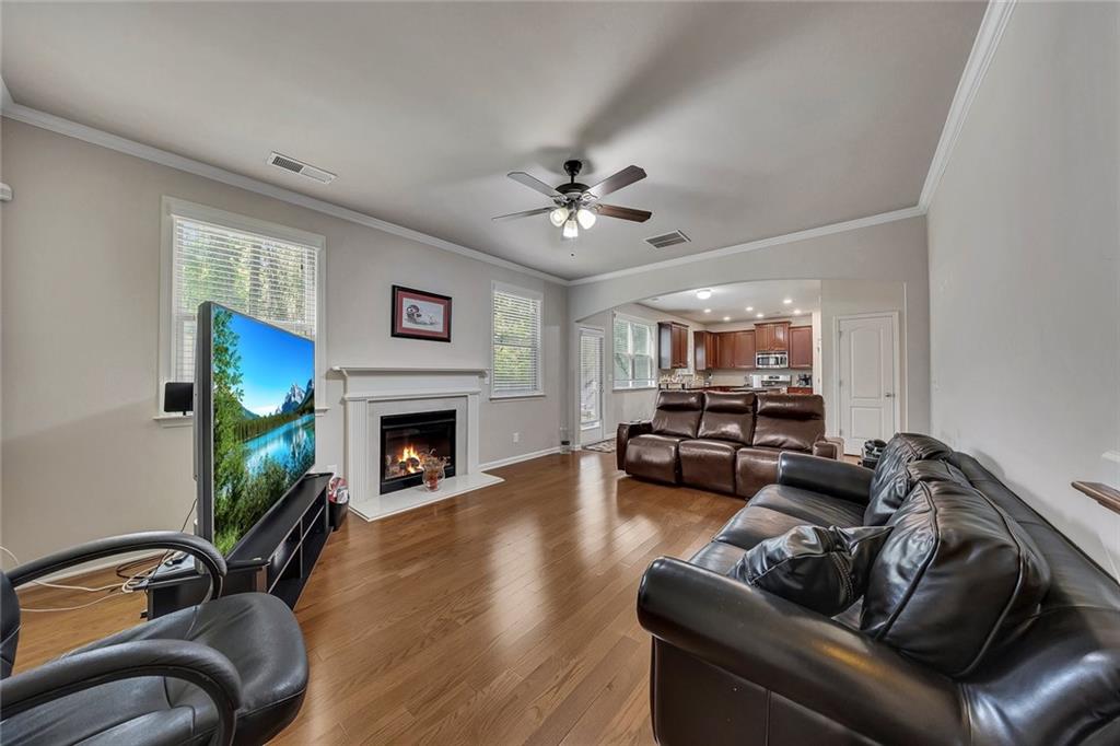 6204 Oakdale Ridge Court Southeast Mableton, GA 30126 - Photo 14 of 48 a living room with furniture and a fireplace