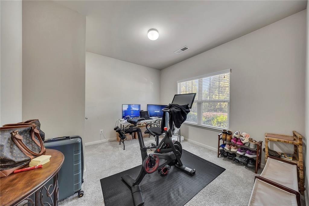 6204 Oakdale Ridge Court Southeast Mableton, GA 30126 - Photo 15 of 48 a view of a workspace with furniture and a window