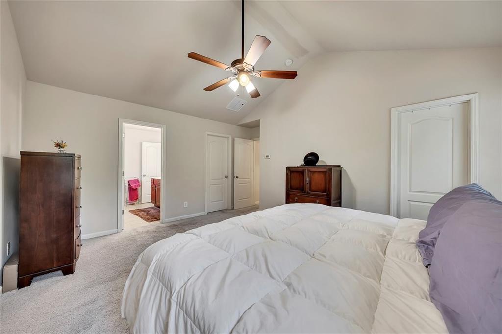 6204 Oakdale Ridge Court Southeast Mableton, GA 30126 - Photo 19 of 48 a bedroom with a bed and a closet