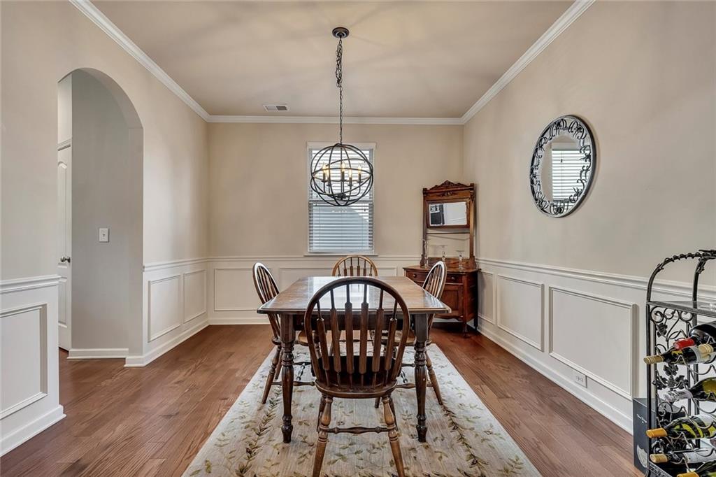 6204 Oakdale Ridge Court Southeast Mableton, GA 30126 - Photo 5 of 48 a view of a dining area with furniture window and wooden floor
