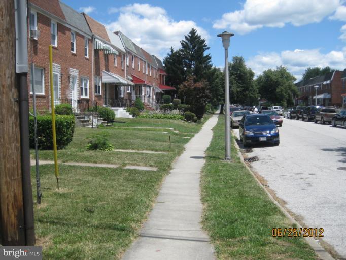 4810 Greencrest Road Baltimore, MD 21206 - Photo 3 of 14 a view of a building with a yard