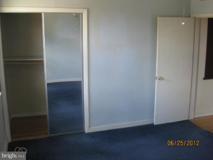 4810 Greencrest Road Baltimore, MD 21206 - Photo 7 of 14 an empty room with closet