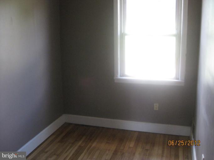 4810 Greencrest Road Baltimore, MD 21206 - Photo 9 of 14 a small space with a window