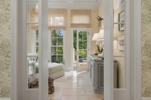 a view of a dining room with furniture window and outside view