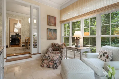 a view of living room and dining room with furniture