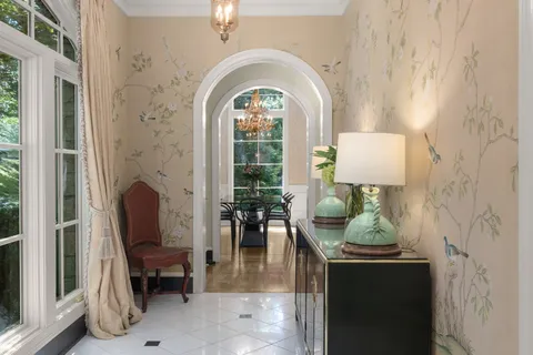 a view of a chairs and tables in the balcony