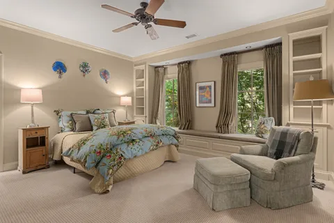 a front view of a house with chairs