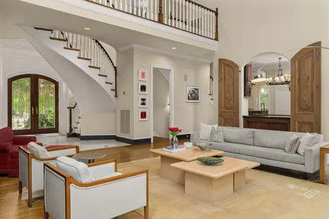 a kitchen with stainless steel appliances granite countertop a stove and refrigerator