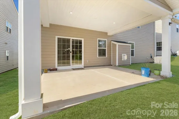 a house with garden in front of it