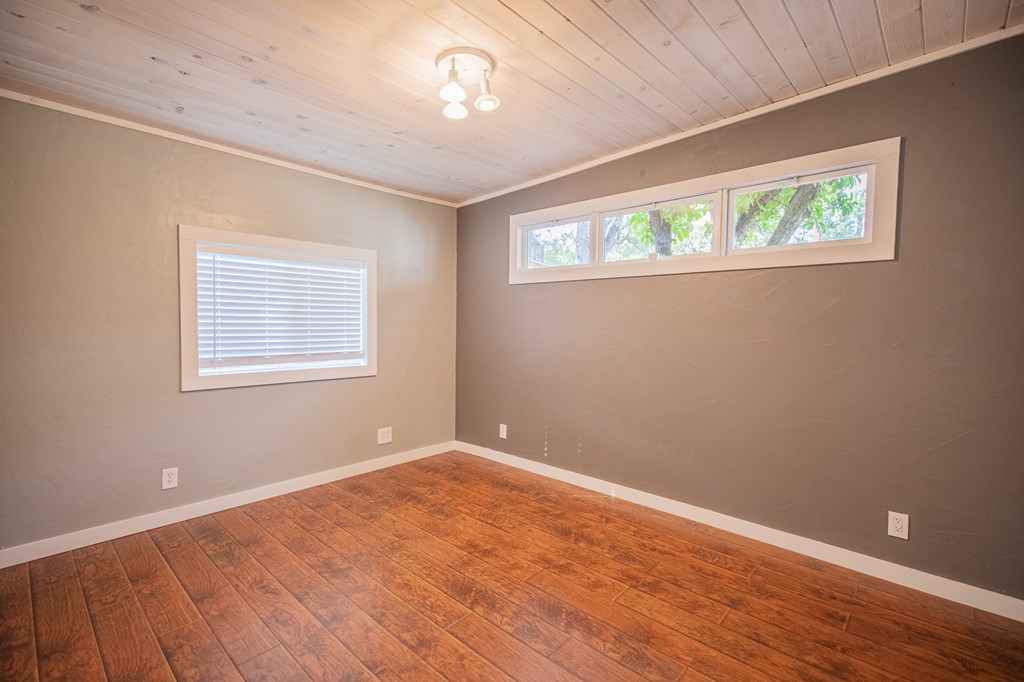 2181 Goat Creek Road Kerrville, TX 78028 - Photo 12 of 25 a view of an empty room with a window