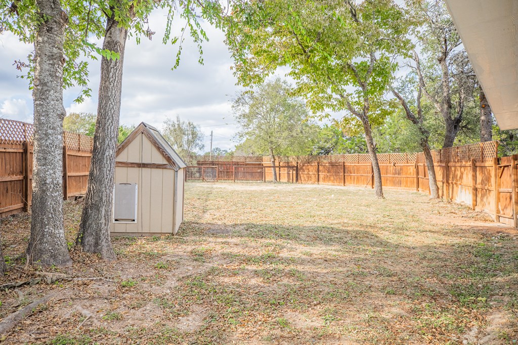 2181 Goat Creek Road Kerrville, TX 78028 - Photo 19 of 25 a view of back yard of the house