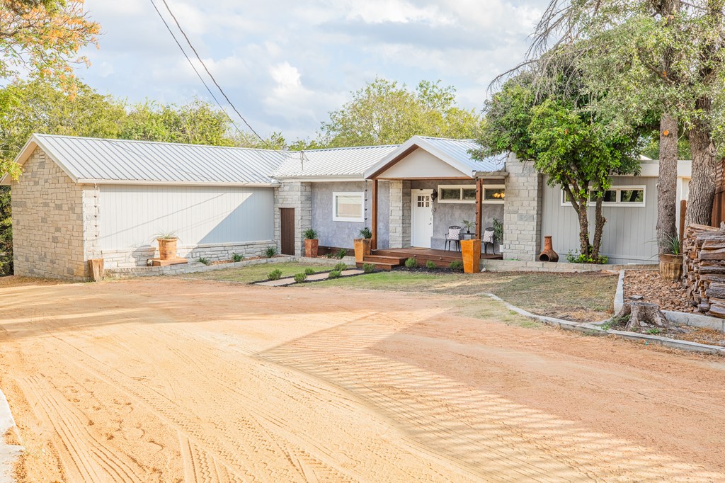 2181 Goat Creek Road Kerrville, TX 78028 - Photo 3 of 25 a front view of a house with a yard
