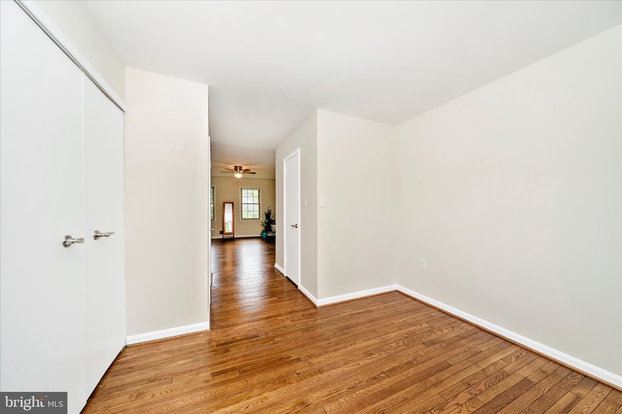 16000 Narrows Terrace Silver Spring, MD 20906 - Photo 26 of 54 a view of a hallway with wooden floor