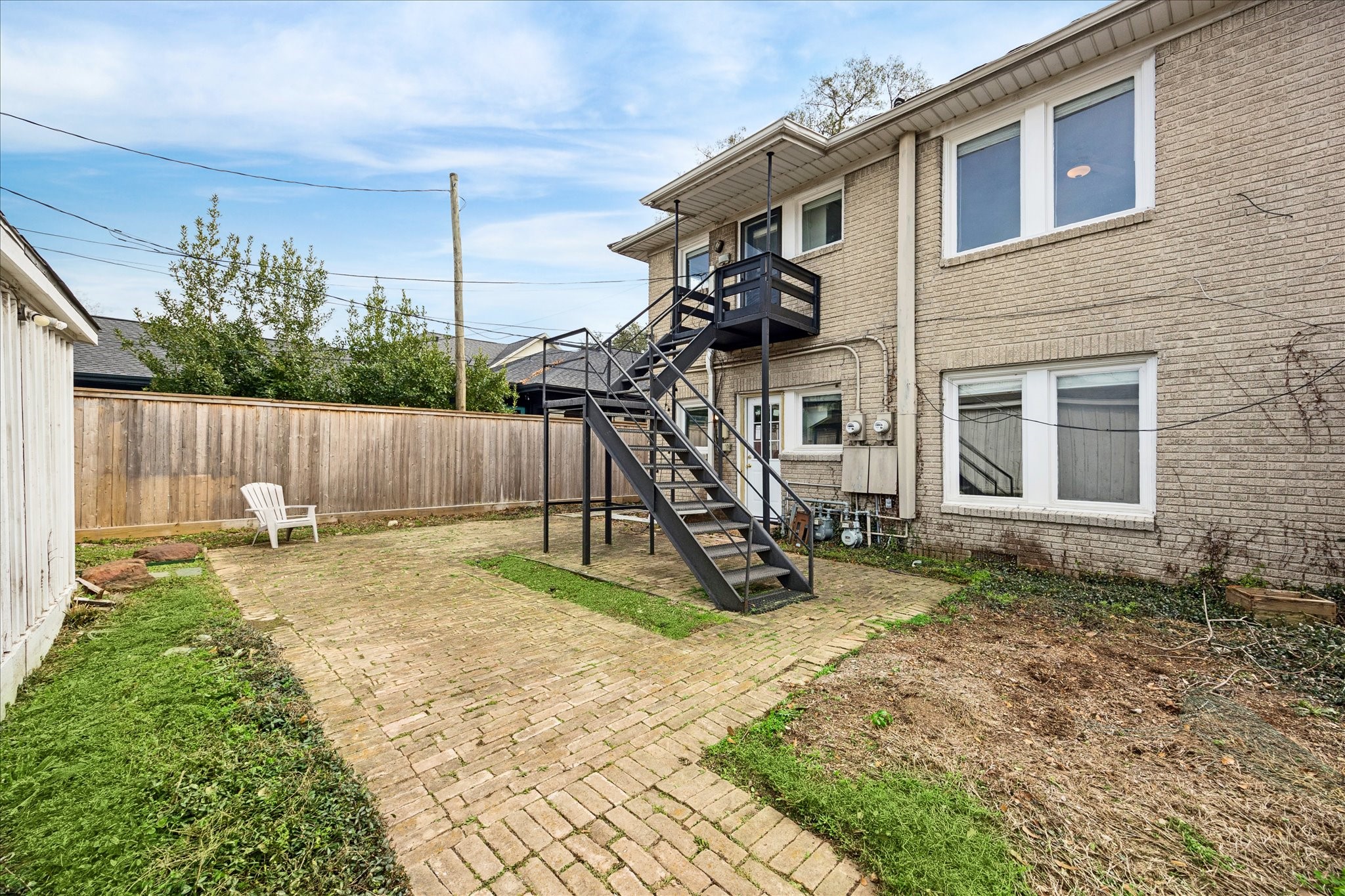 1758 Hawthorne Street Houston, TX 77098 - Photo 20 of 27 a view of a backyard with a table and a slide