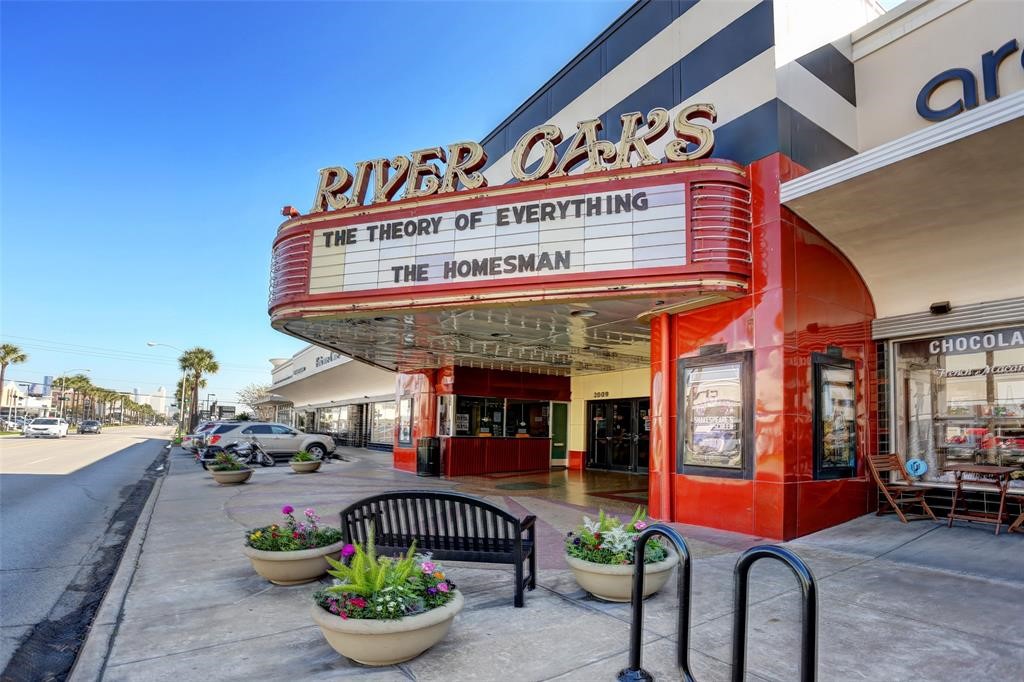 1758 Hawthorne Street Houston, TX 77098 - Photo 24 of 27 a front view of a building with patio furniture and a potted plant