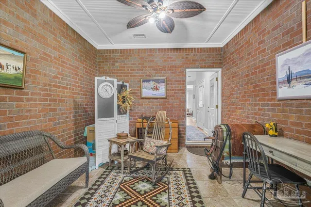 a view of a livingroom with furniture and lounge chair