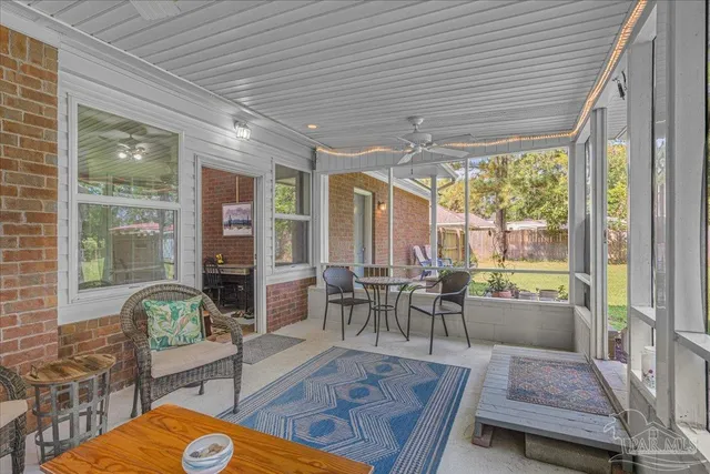 a work room with large windows