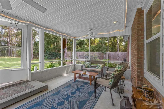 a view of a house with a yard and a garden