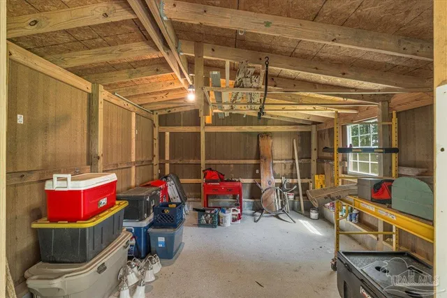 a room with furniture and a chandelier