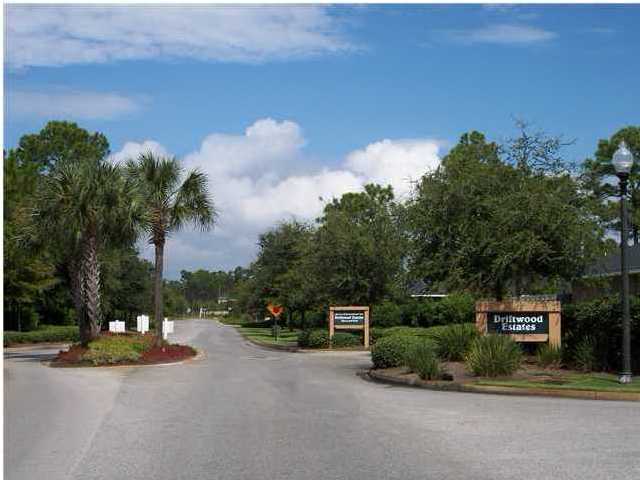 98 Red Maple Court Santa Rosa Beach, FL 32459 - Photo 1 of 3 a view of a street with a building in the background