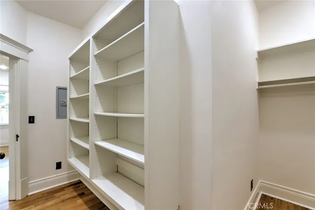 a view of a backyard with plants and a patio