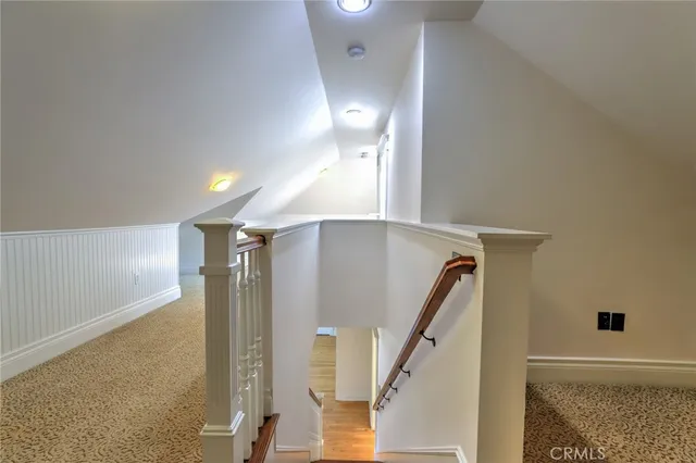 a front view of a house with a yard table and chairs